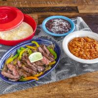 Steak Fajita · with red bell peppers, sauteed onions, roasted garlic served with sofrito rice, black beans,...
