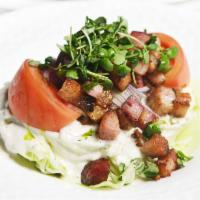 Wedge Salad · Diced Canadian bacon, tomatoes, onions and bleu cheese dressing. 