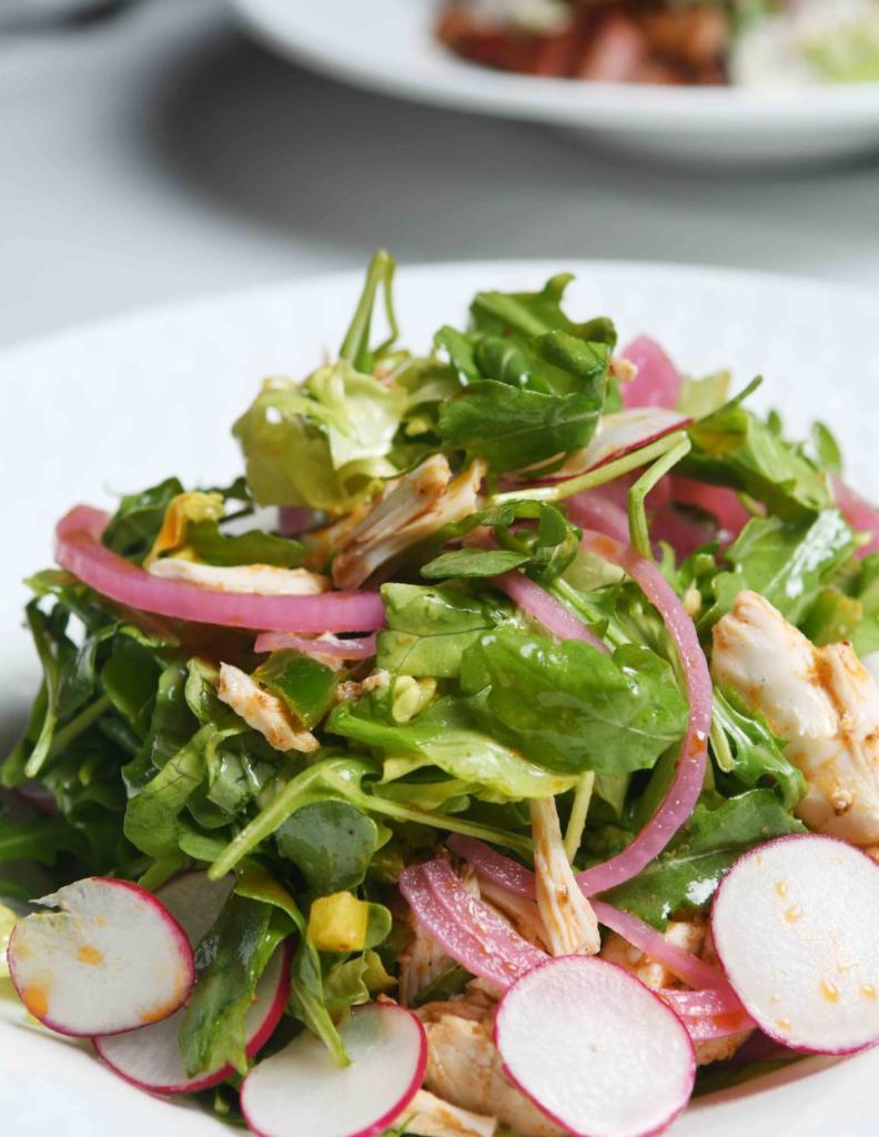 The Prime Salad · Jumbo lump crab meat, bibb lettuce, arugula, radish and spicy oil.