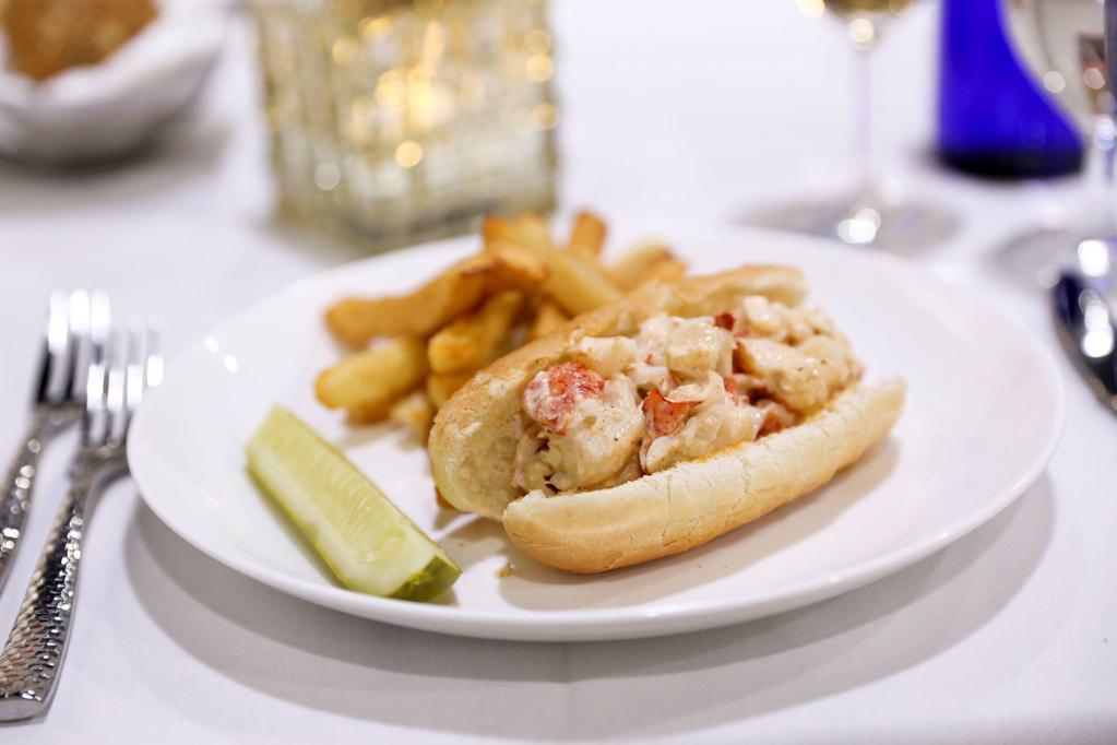 Lobster  Roll Sandwich  · Pickles.