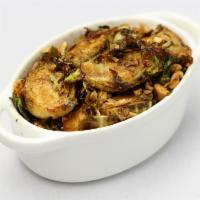 Crispy Brussel Sprout ·  Marcona almonds, sweet and spicy glaze.