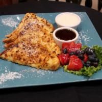 Vanilla French Toast · Cornflake crusted slices of Texas bread topped with vanilla cream fraiche and served with a ...