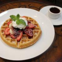 Belgian Waffle · Fresh seasonal fruit or sweet marmalade topping and whipped cream. Side of Canadian maple sy...