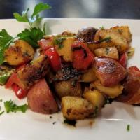 Homestyle Potatoes · Roasted organic potatoes with organic red and yellow peppers, organic onions.