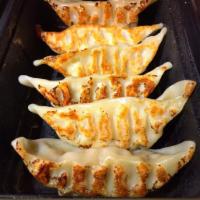 Gyoza · Steamed or pan fried pork dumplings. (5 pieces)