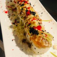 Yokohama Maki · Salmon, tuna. cucumber, crunch, tobiko with wasabi sauce and spicy kabayaki sauce wrapped in...