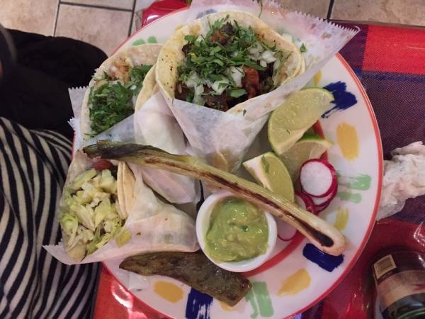 Carne Asada Taco · Grilled beef. Accompanied with chambray grilled onions, nopal and grilled Serrano peppers. Served with onions, cilantro and a side of guacamole.