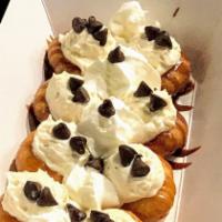 Mini Cannoli’s  · A classic cannoli done right! A Mini Cannoli pastry dough filled with a blend of sweet ricot...