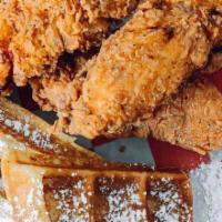 Lil Chicken ＆ Waffles Classic · 3 boneless chicken tenders paired with half of a waffle. Served with hot sauce, maple syrup,...