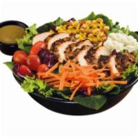 Chicken Breast Salad · Your choice of Campero Fried or Grilled Chicken, spring mix, roasted corn & peppers, shredde...