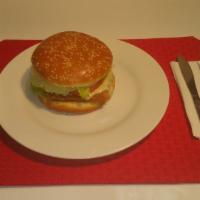 09. Fish Sandwich · Served on a fresh toasted sesame bun with Whiting Fish and, with lettuce, tomato, pickles, o...