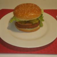 Chicken Sandwich · Served on a fresh toasted sesame bun all white meat Chicken  with lettuce, tomato, pickles, ...