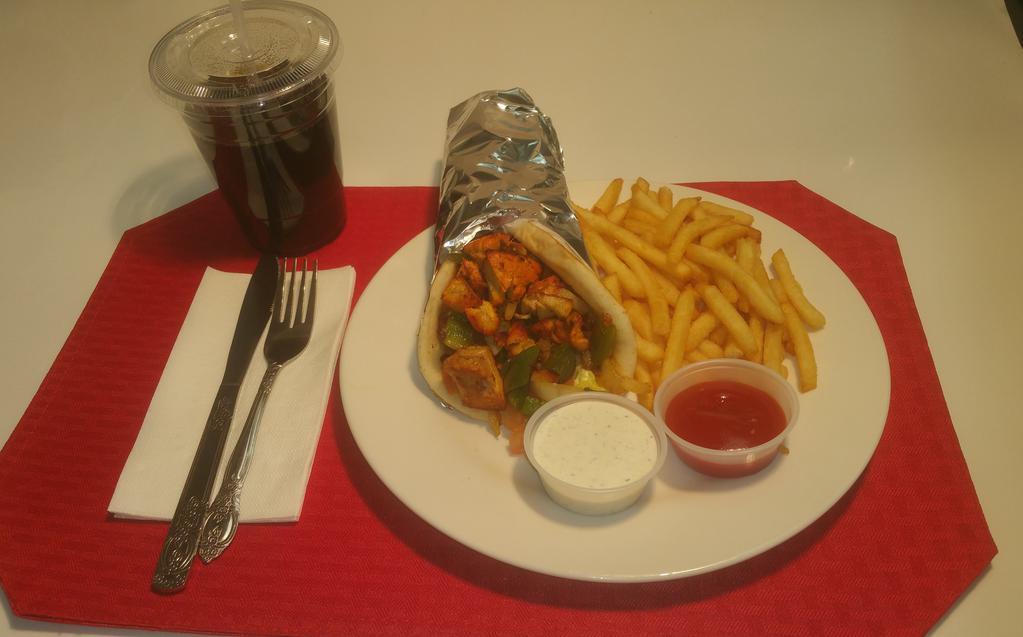 10.  Chicken Gyro Sandwich Combo · Chicken is grilled with Green Peppers and Onions to a perfection and served on a fresh warm Pita Bread, with lettuce and tomatoes, and with Cucumber sauce (White Sauce). Comes with a order of French Fries and a can of Soda or a Small bottle of Water.