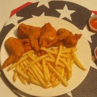 18. 6 Pieces of whole Chicken Wings combo · Comes with  6  Pieces of our delicious fried Whole Chicken Wings  and a order of French Frie...