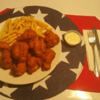 15 Pieces of Hot Wings With French Fries · Comes with 15 Pieces of our famous Hot Wings and French Fries. Dipping Sauce: Blue Cheese, R...