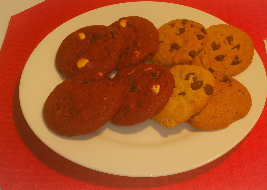 2 Pieces Cookies · These Delicious Cookies are Bakes Daily on the Premises. Chocolate Chip. Red Velvet, or Macadamia Nut Cookies