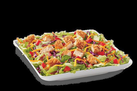 Crispy Chicken Strips Salad Bowl · Served with your choice of dressing and topped with crispy chicken, chopped tomatoes, crispy bacon bits and shredded cheddar cheese.