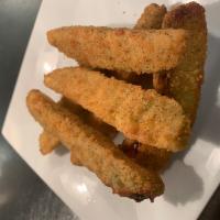 Fried Pickles · Fried pickle spears served with ranch.