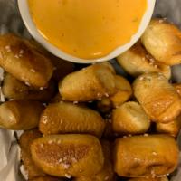 Pretzel Bites · Served with white cheddar beer cheese sauce.