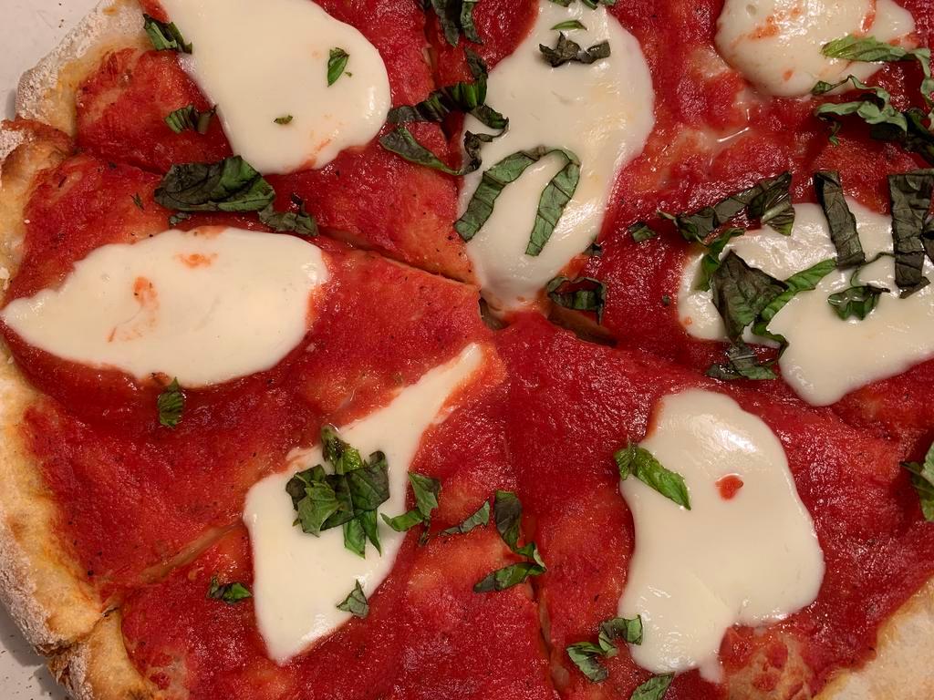 Margarita Pizza · Tomato sauce, fresh mozzarella, and fresh basil.