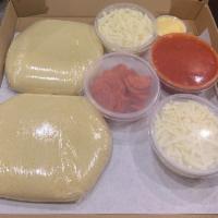 Pizza Kit · Includes 2 Doughs, Sauce, Cheese and Semolina to make our delicious pizza at home. *Toppings...