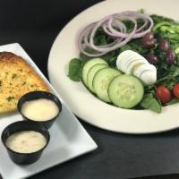 House Spinach Salad · House Spinach Blend served with choice of dressing on the side & garlic bread.