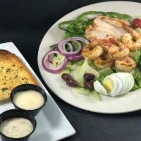 EVO Combo Salad · House Salad Blend topped with Grilled Chicken & Shrimp. Served with dressing of choice on th...