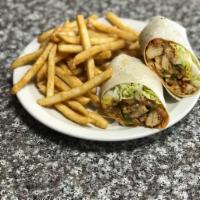 Chicken Cheesesteak Wrap · Fried onions, green peppers, lettuce, tomatoes, and mozzarella cheese. Served with french fr...