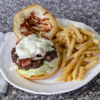 Texas Burger · Provolone cheese, fried onion, bacon and BBQ sauce. Fresh homemade 8 oz. beef served on a Br...