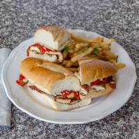 Chicken Cutlet Sandwich · Homemade fresh chicken cutlet topped with homemade roasted red peppers and sharp provolone c...