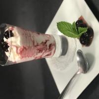 Coppa Spagnola · Vanilla gelato and amarena cherry sauce swirled together, topped with amarena cherries serve...