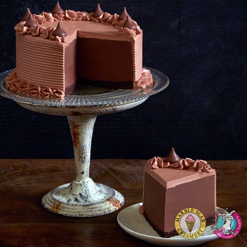 Chocolate Heaven Ice Cream Cake · We DO NOT DO Any Writing or Custom made cake for all order through Third Party Delivery.  

Now here’s a cake to die for! This rich, indulgent chocolate cake features our award-winning Chocolate Ice Cream topped with Hershey’s® Kisses. Consider it eternal bliss for your taste buds.
