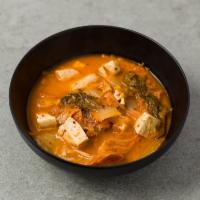 S3 Kimchi Ji Gae · Spicy kimchi stew with pork, sweet potato noodles, tofu and other vegetables. Served with wh...