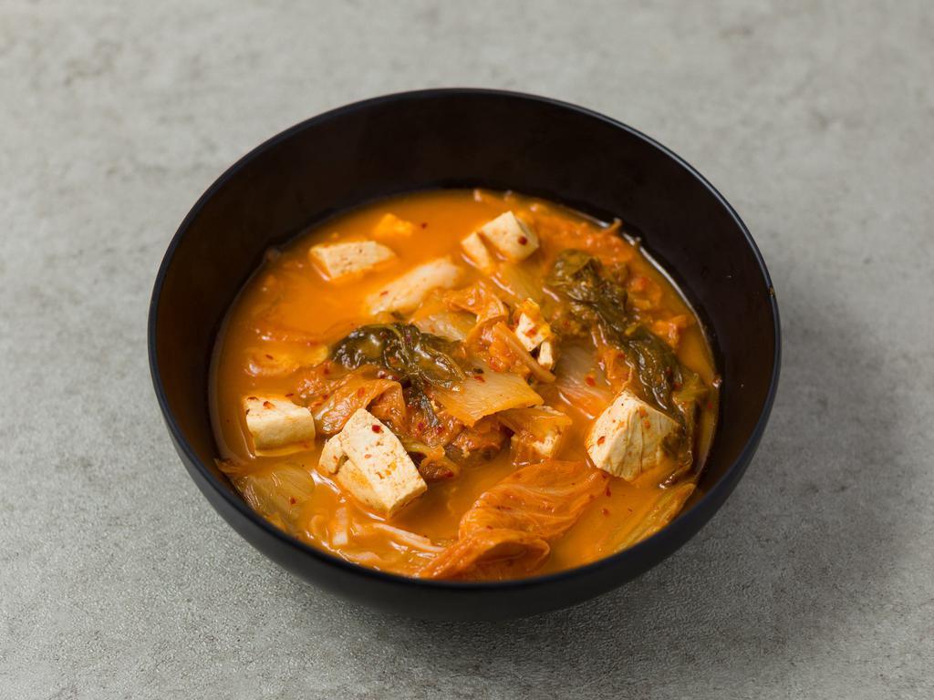 S3 Kimchi Ji Gae · Spicy kimchi stew with pork, sweet potato noodles, tofu and other vegetables. Served with white rice. 