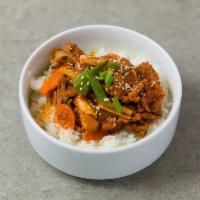 E9 Jae Yook Bo Keum · Stir-fried pork loin, rice cake and vegetables marinated in hot and sweet gochujang sauce wi...