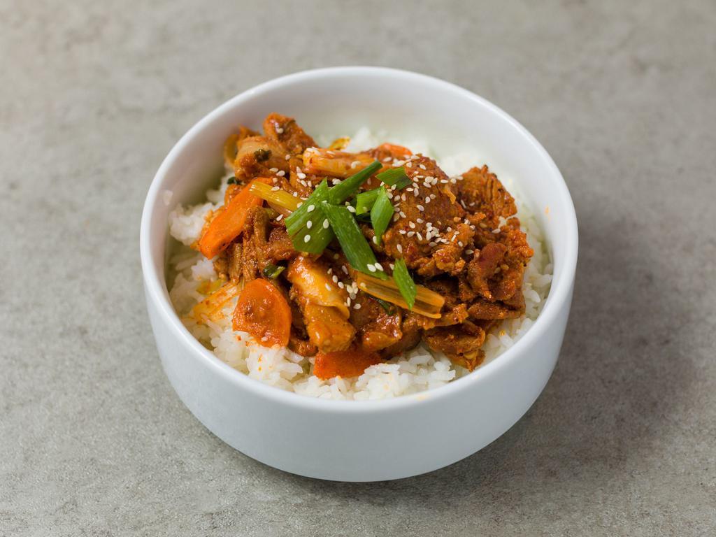 E9 Jae Yook Bo Keum · Stir-fried pork loin, rice cake and vegetables marinated in hot and sweet gochujang sauce with white rice. 
