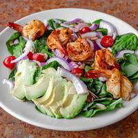 Grilled Shrimp and Avocado Salad  · Over baby spinach with red onions, sliced almonds and tomato.