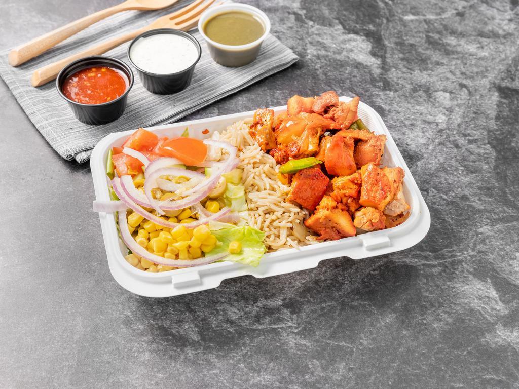 Chicken Platter · Marinated chicken cooked with green peppers, onion, brown basmati rice, and fresh vegetables. Lettuce, tomato, cucumber, green olives, corn, and red onion.