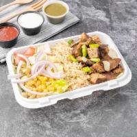 Lamb Platter · Cube of lamb cooked with green peppers and onion, brown basmati rice, and fresh vegetables; ...