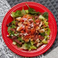 Mardi Gras Salad · Cajun chicken or steak, with turkey bacon, tomatoes, red onions and low carb salsetta dressi...