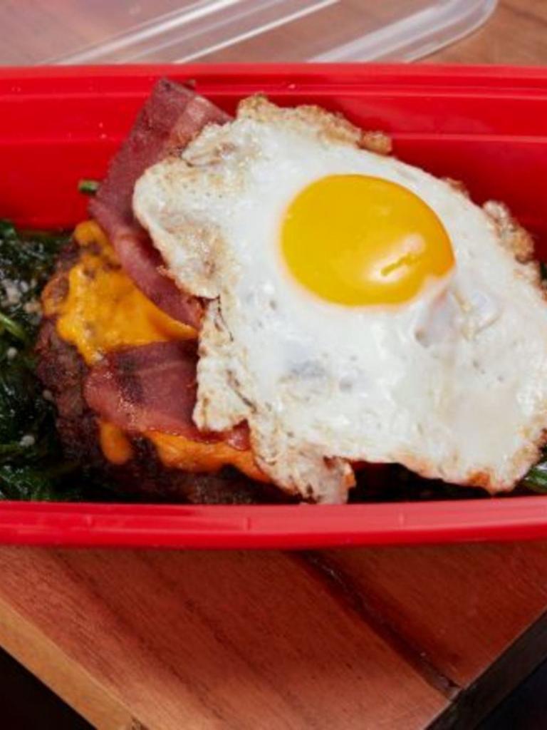 Keto Recovery Burger · Our delicious grass-fed beef burger, turkey bacon, cheddar cheese, and a fried egg on top of our savory spinach.