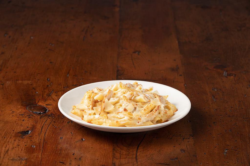 Italian Pasta - Alfredo · Penne baked in creamy alfredo sauce, topped with grilled chicken, mozzarella and shaved parmesan.
