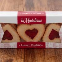 Linzer Cookie 9-Pack · Classic heart-shaped shortbread cookies sandwiched with raspberry jam and sprinkled with cry...