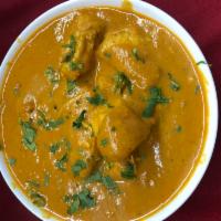 Chicken Curry  · Tender pieces of chicken cooked in a seasoned authentic curry sauce.