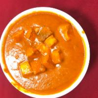 Paneer Tikki Masala  · Diced paneer in a tomato yogurt curry.