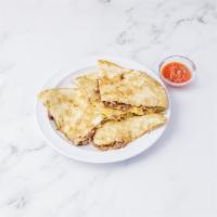 Steak Quesadilla · Sauteed onions and peppers with grilled chicken and cheddar cheese.