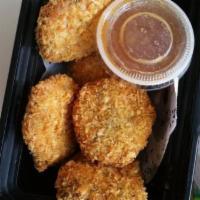 A17. Crispy Soy Protein · Breaded, deep-fried soy protein nuggets with plum sauce.