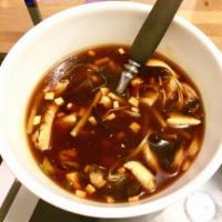 S3. Hot and Sour Soup · With silken tofu, mushrooms and bamboo shoots. Spicy.