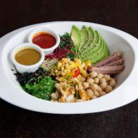 R5. Korean Rice Bowl · Topped with seitan, avocado, green and black seaweed, chickpeas, spinach, alfalfa sprouts, m...