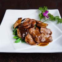 M17. Black Pepper Seitan · Wheat protein sauteed in a savory black pepper brown sauce with Chinese broccoli. With brown...